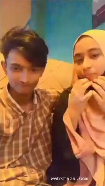 Restaurant Young Boy Enjoying With His Hijabi GF In